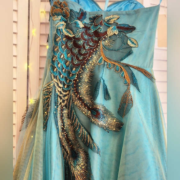 Elegant Teal Gown with Peacock Embellishments - Picture 2 of 4